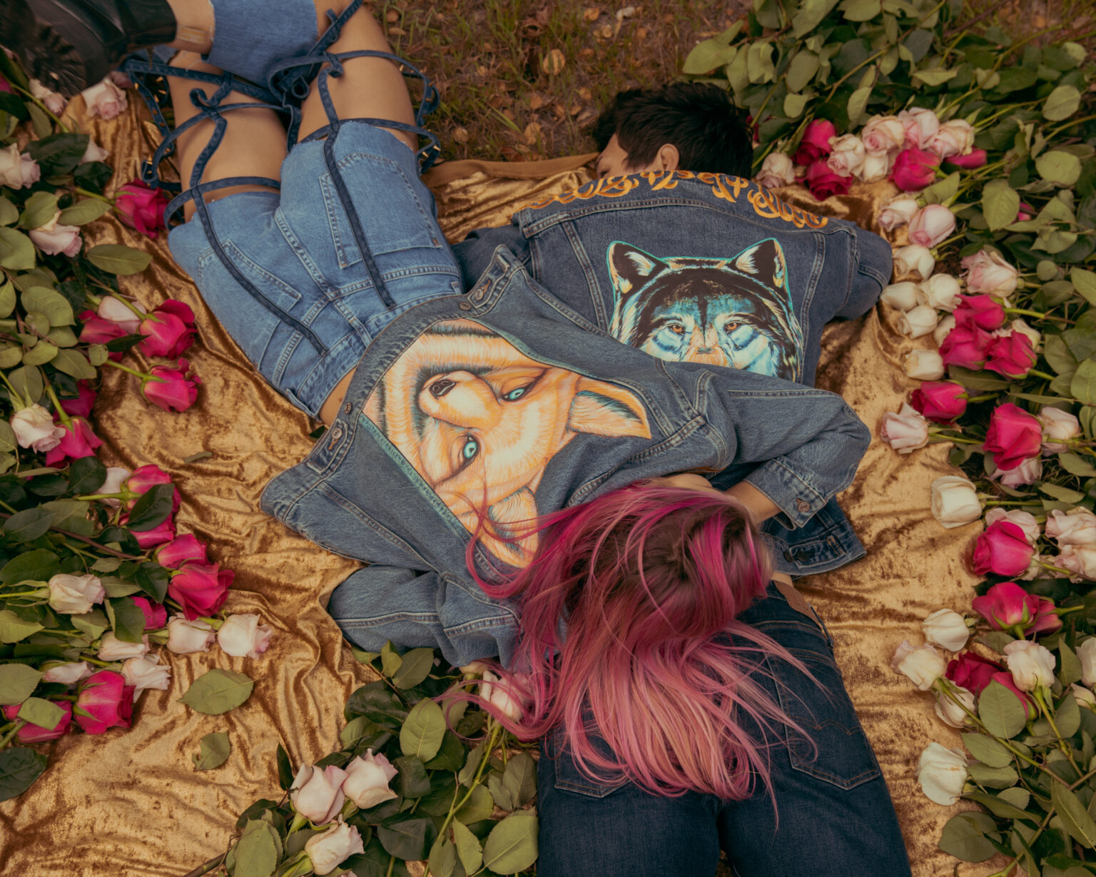 Two Animalize capsule denim jackets among roses